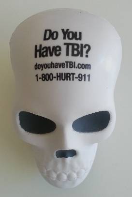 squeeze ball skull showing the front with advertising awareness of traumatic brain injury for motorcycle lawyers