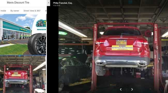 Free advertising with a car sign and license plate billboard on a car at an auto shop shown on Google maps